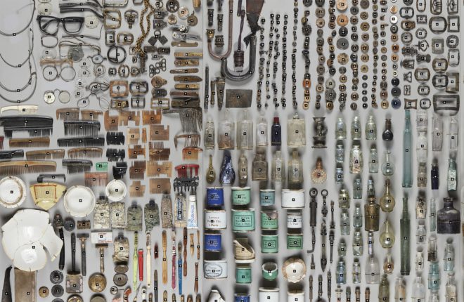 a background image with hundreds of found objects laid out